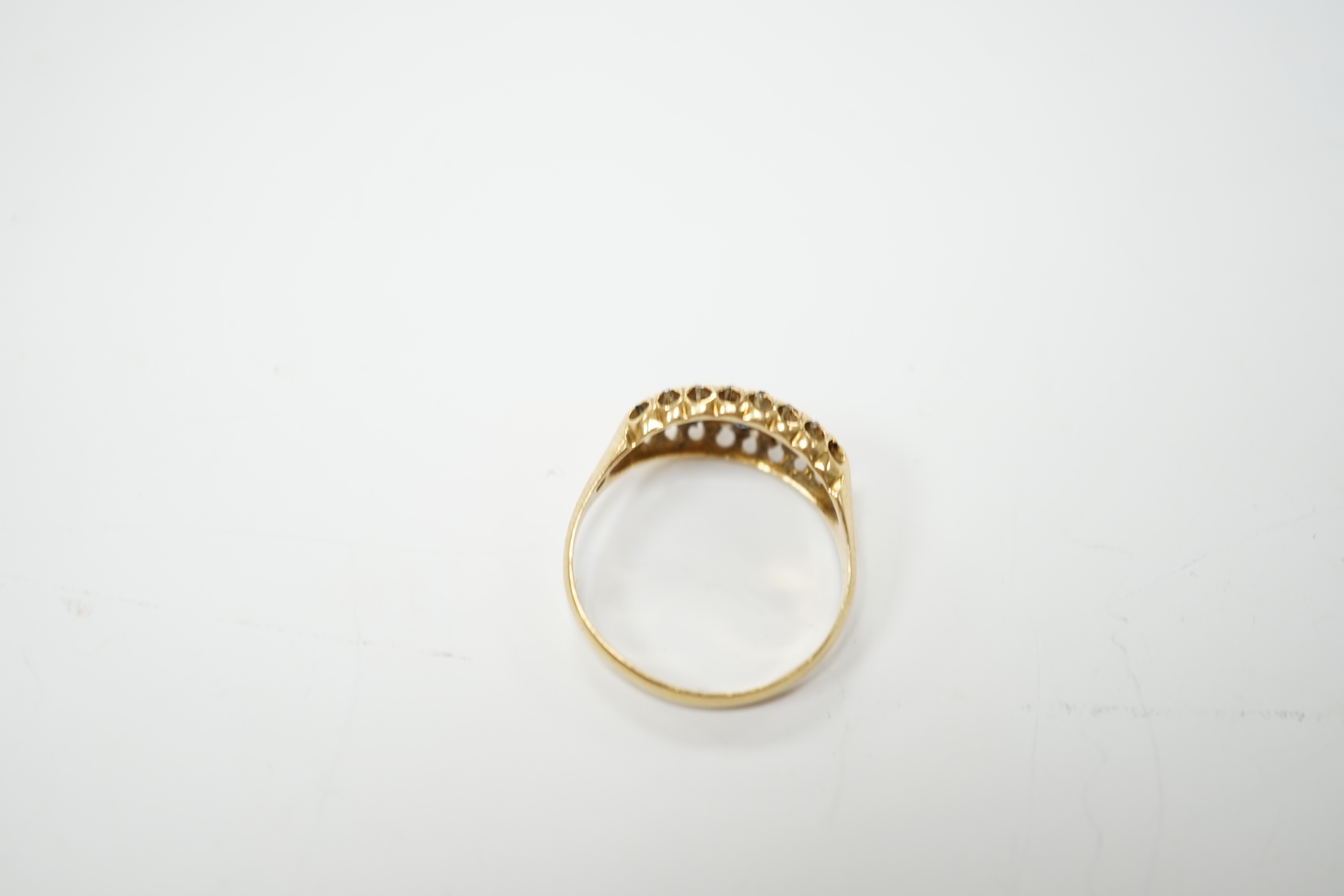 A George V 18ct gold, sapphire and diamond cluster set navette shaped ring, size N, gross weight 2.7 grams.